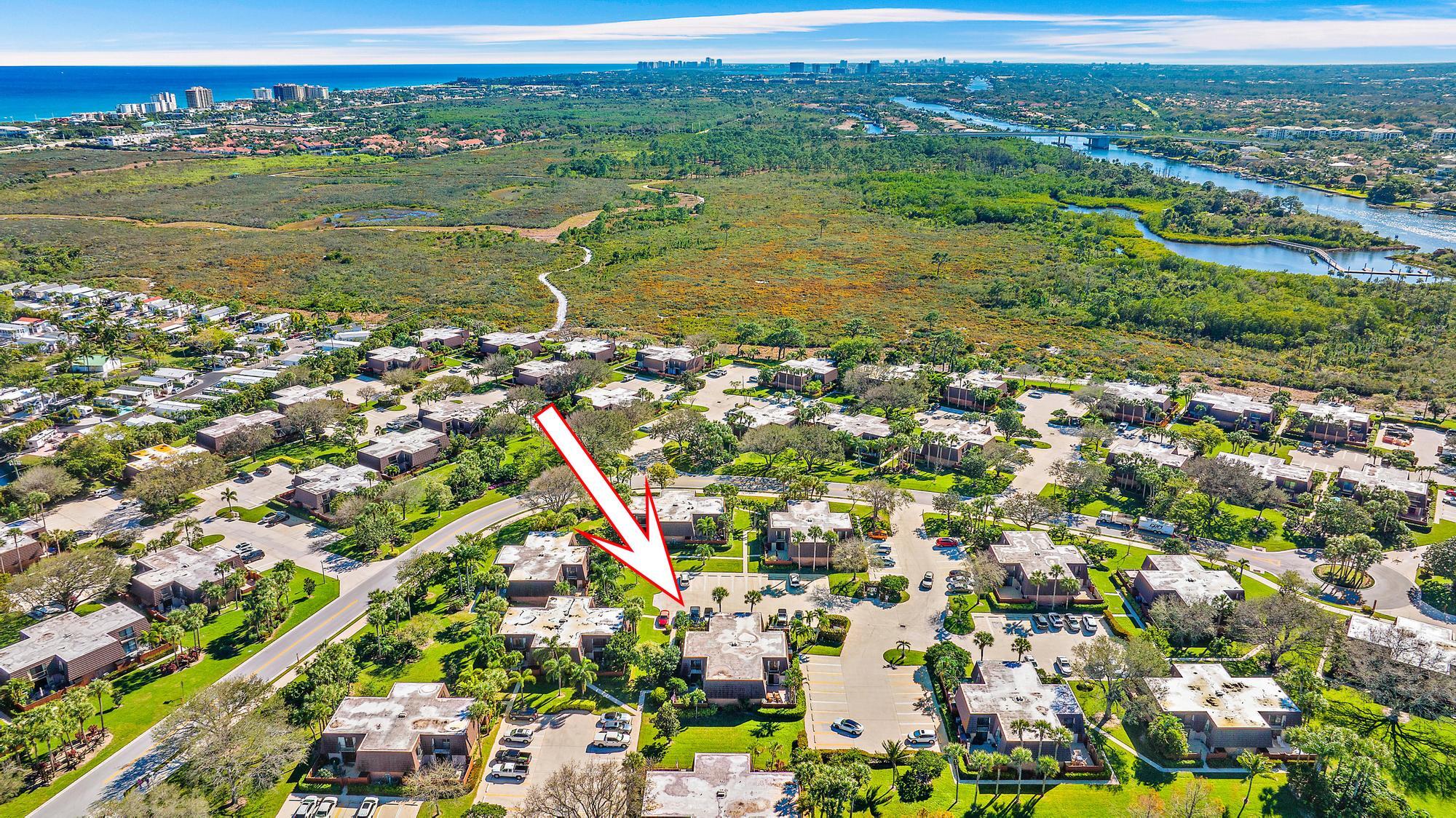 2018 20th Court Jupiter, FL 33477 - Photo 21 of 24 an aerial view of residential houses with outdoor space and river