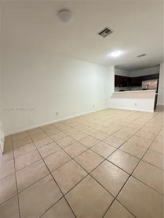 a bathroom with a sink toilet and a mirror