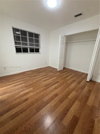 a bathroom with a sink a vanity and a mirror
