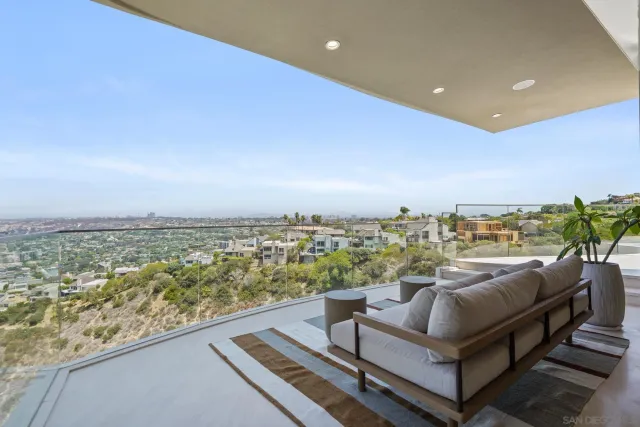 a view of a terrace with furniture