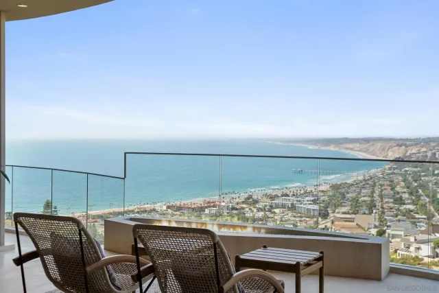a view of a chairs and table in the terrace