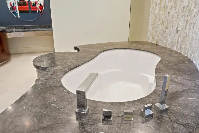 a view of room with window and wooden floor