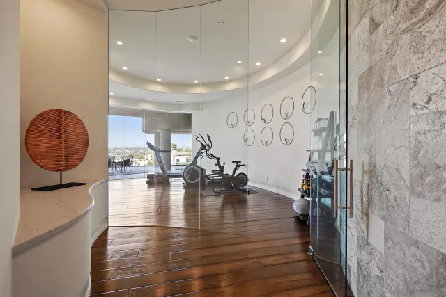 a bathroom with a bathtub and shower