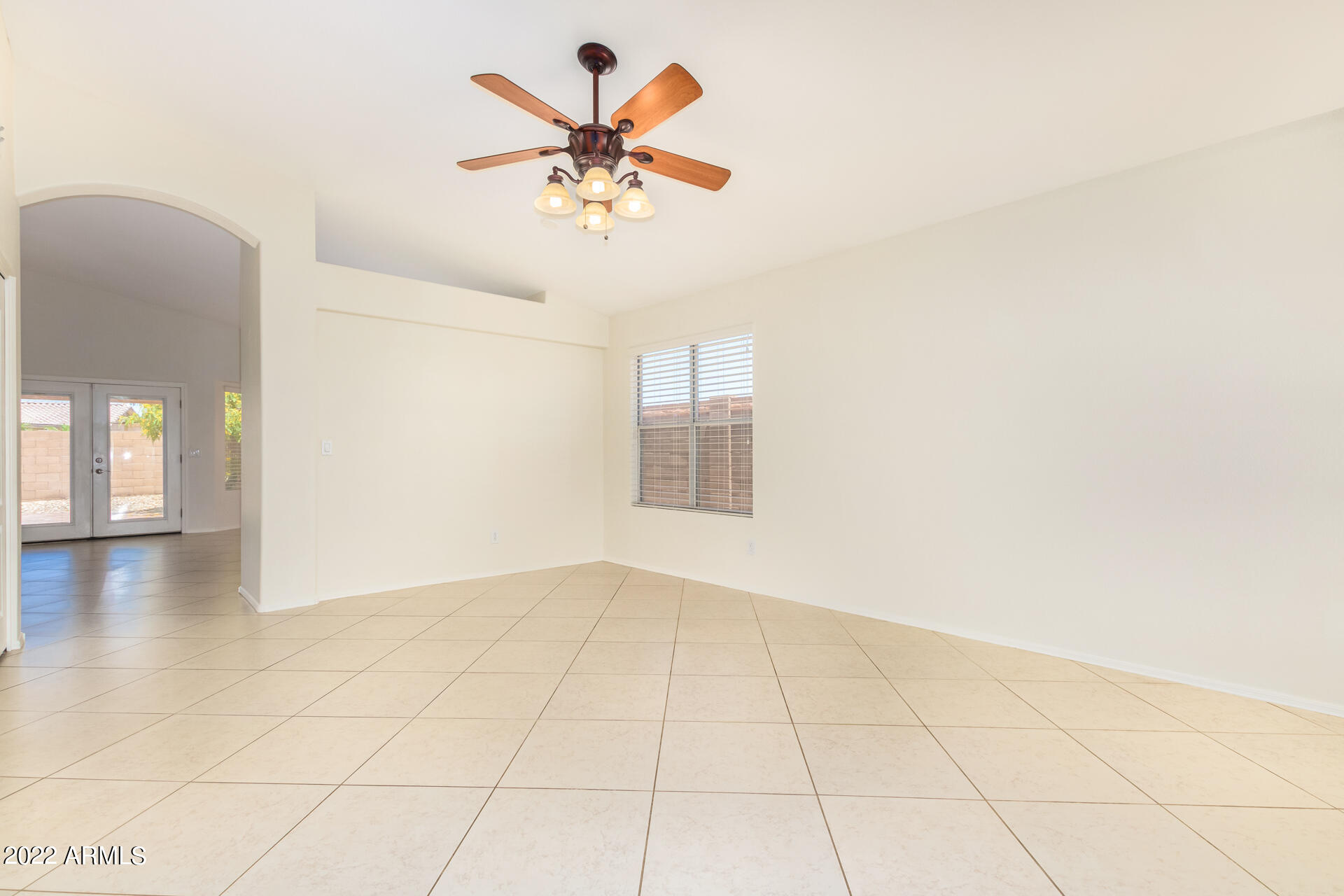 9924 West Burnett Road Peoria, AZ 85382 - Photo 11 of 24 a view of an empty room and window