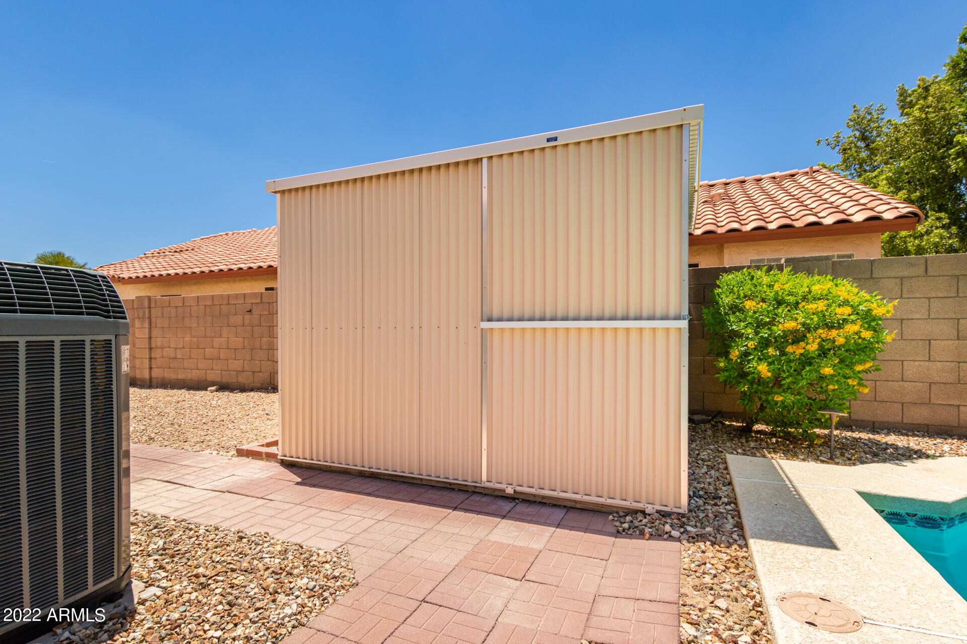 9924 West Burnett Road Peoria, AZ 85382 - Photo 22 of 24 a view of a house with backyard