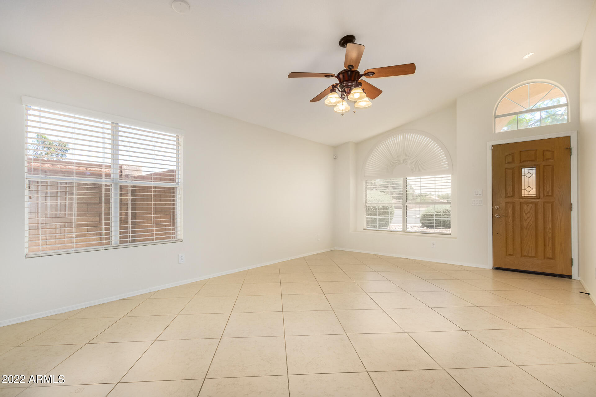 9924 West Burnett Road Peoria, AZ 85382 - Photo 10 of 24 a view of an empty room with a window