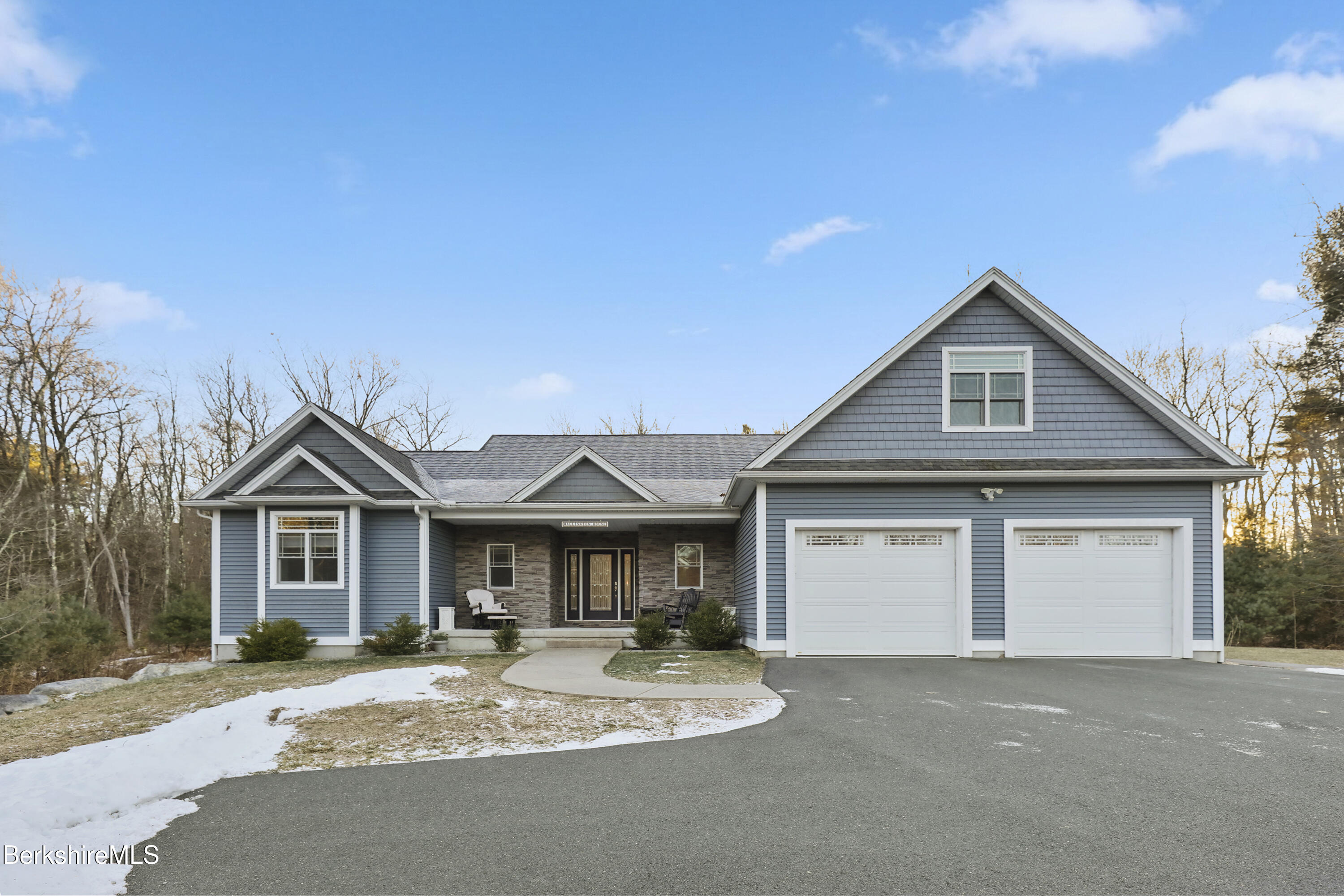 2012 East Otis Road Otis, MA 01029 - Photo 1 of 53 a front view of a house with yard fire pit and outdoor seating