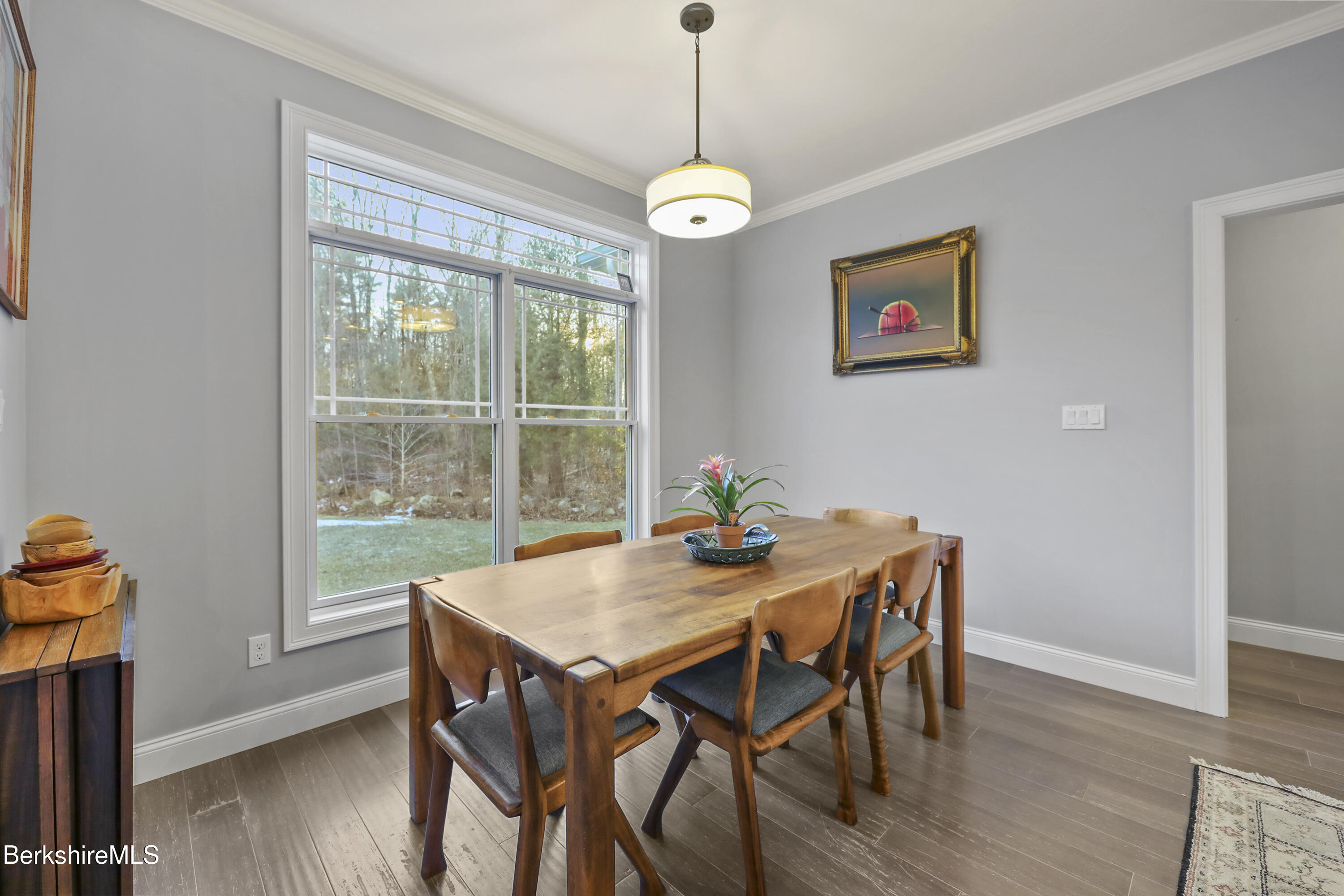 2012 East Otis Road Otis, MA 01029 - Photo 13 of 53 a view of a dining room with furniture window and wooden floor