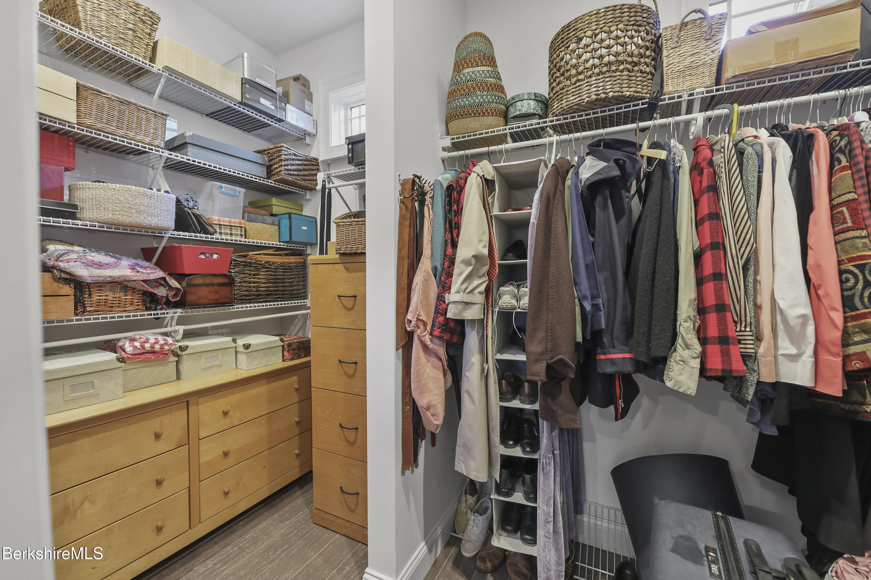 2012 East Otis Road Otis, MA 01029 - Photo 18 of 53 a view of walk in closet with clothes and shoes