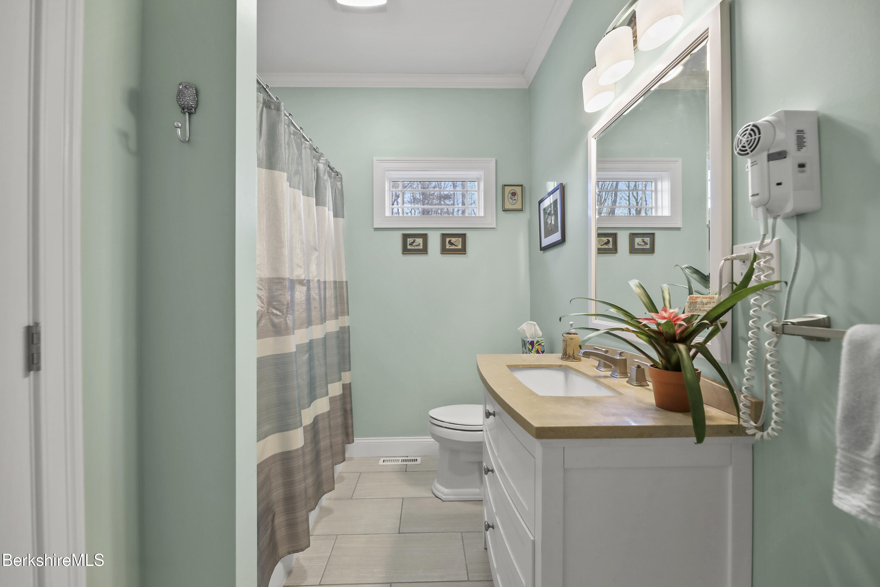 2012 East Otis Road Otis, MA 01029 - Photo 25 of 53 a bathroom with a sink mirror and toilet