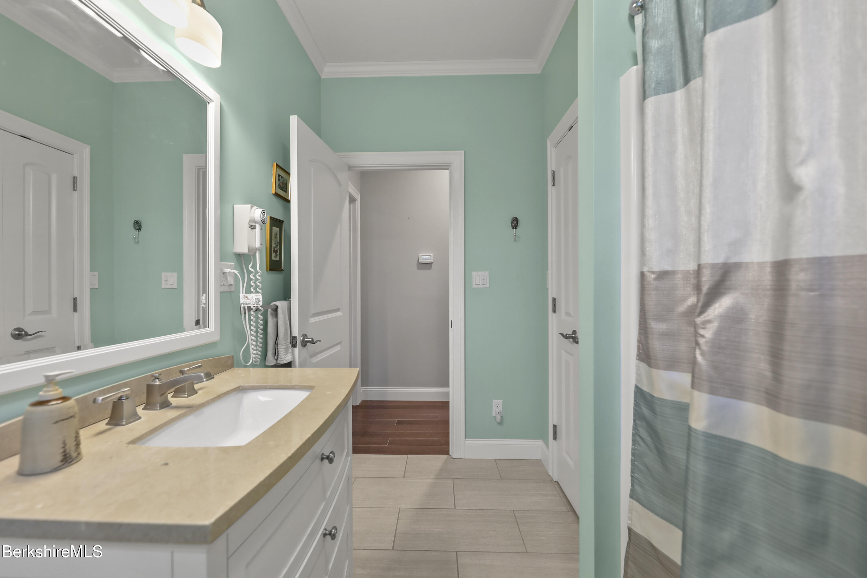 2012 East Otis Road Otis, MA 01029 - Photo 26 of 53 a bathroom with a granite countertop sink and a mirror