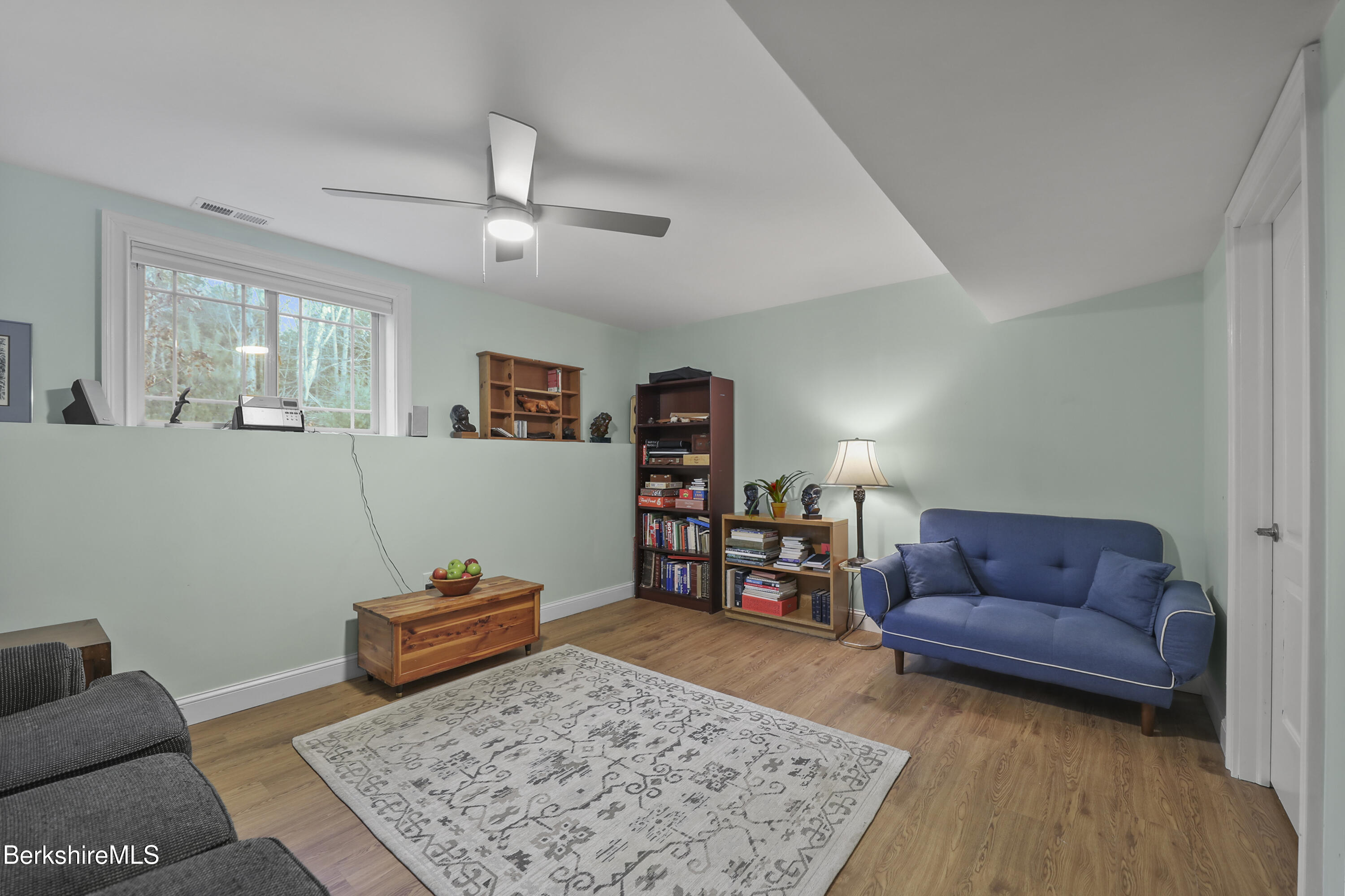 2012 East Otis Road Otis, MA 01029 - Photo 32 of 53 a living room with furniture and wooden floor