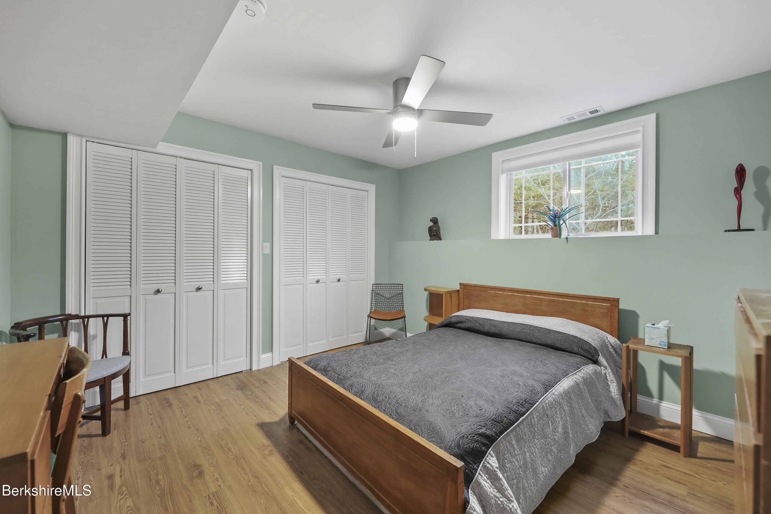 2012 East Otis Road Otis, MA 01029 - Photo 34 of 53 a bedroom with a bed and wooden floor