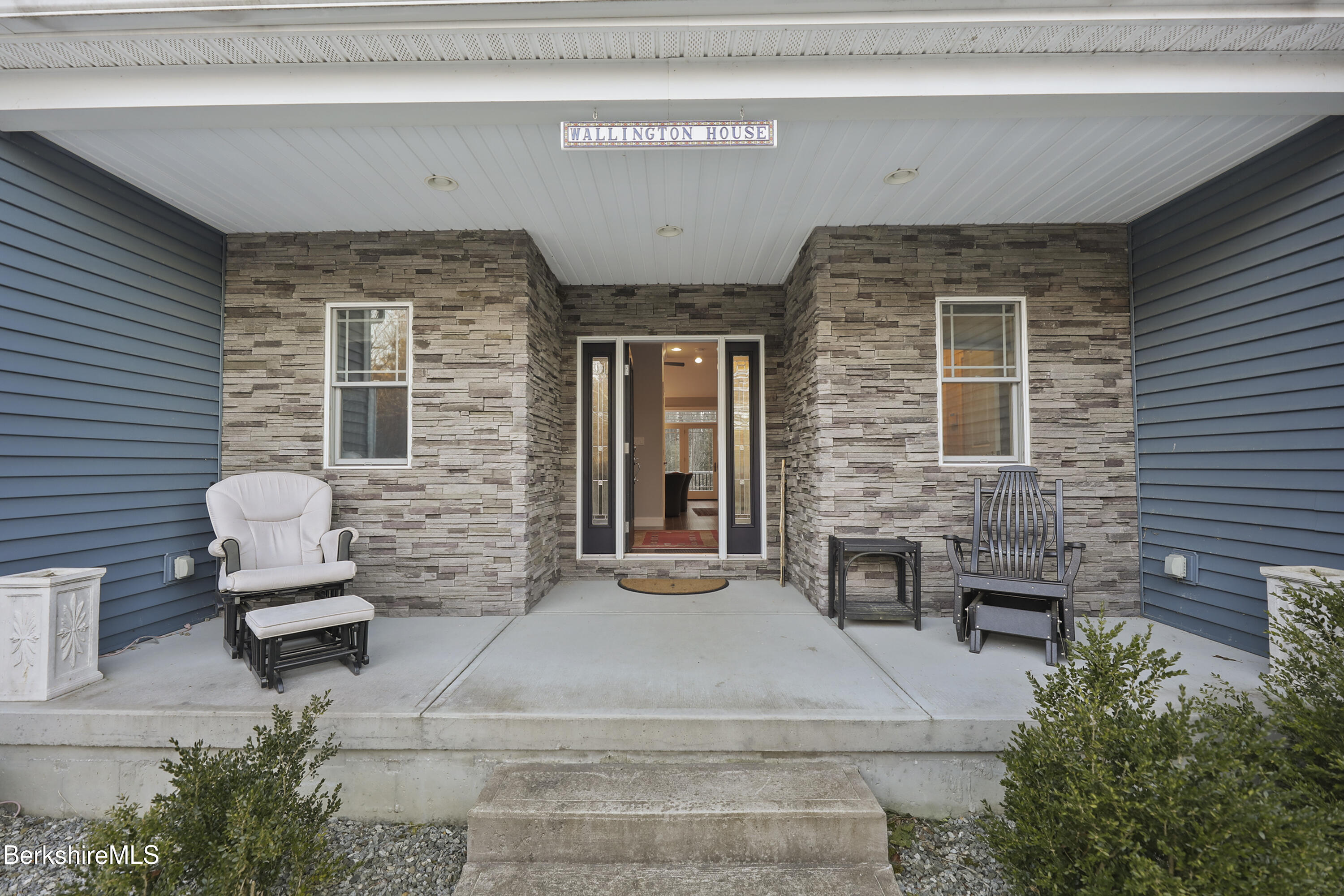 2012 East Otis Road Otis, MA 01029 - Photo 4 of 53 a front view of a house with outdoor seating