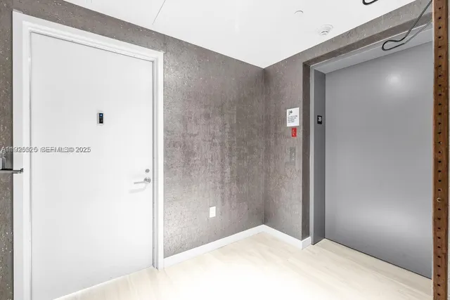 a view of a hallway with closet area