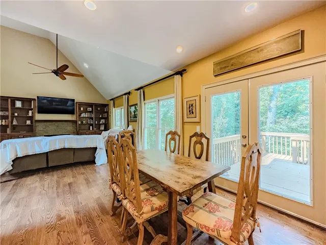 a living room with furniture fireplace and flat screen tv
