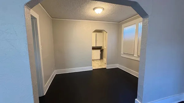 an empty room with windows