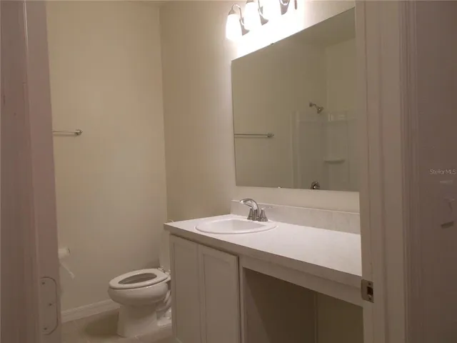 a bathroom with a sink and a toilet