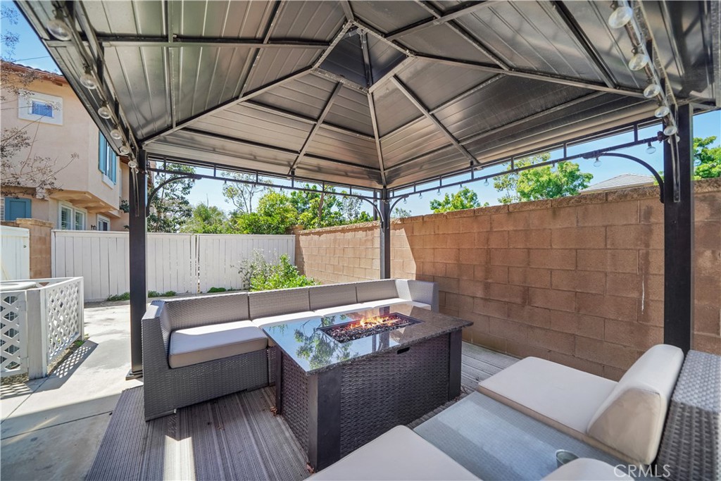 23 Carnation Irvine, CA 92618 - Photo 22 of 30 a view of outdoor sitting area with furniture and wooden deck