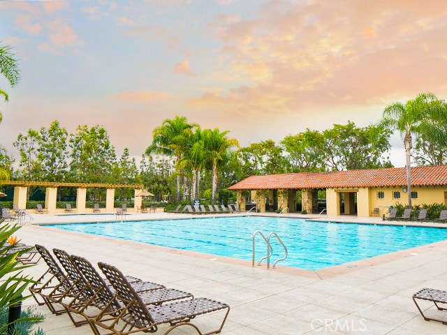 23 Carnation Irvine, CA 92618 - Photo 25 of 30 a house with swimming pool in front of it