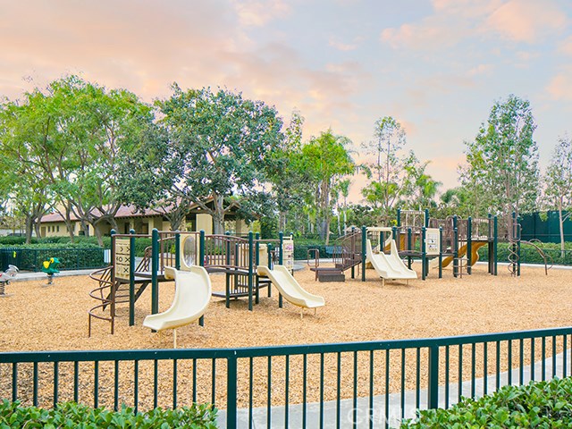 23 Carnation Irvine, CA 92618 - Photo 27 of 30 a view of a swimming pool with a patio and garden