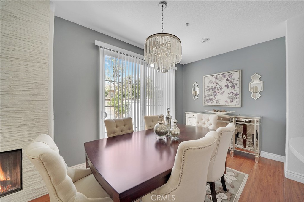 23 Carnation Irvine, CA 92618 - Photo 9 of 30 a view of a dining room with furniture window and wooden floor