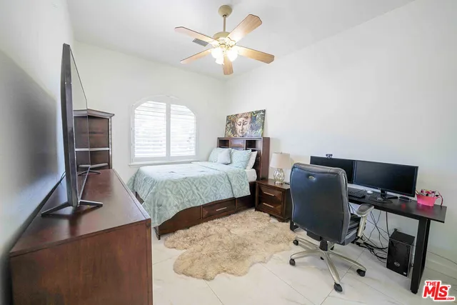 a bedroom with a bed and furniture