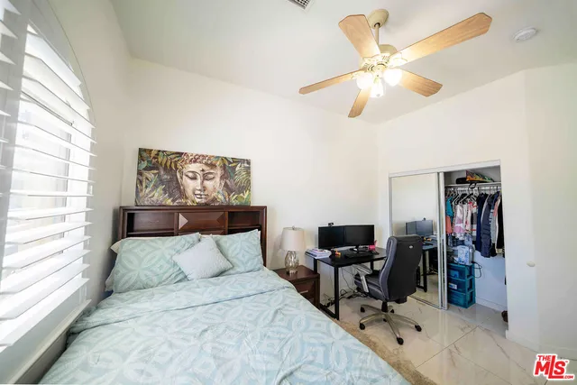 a hallway with washer and dryer
