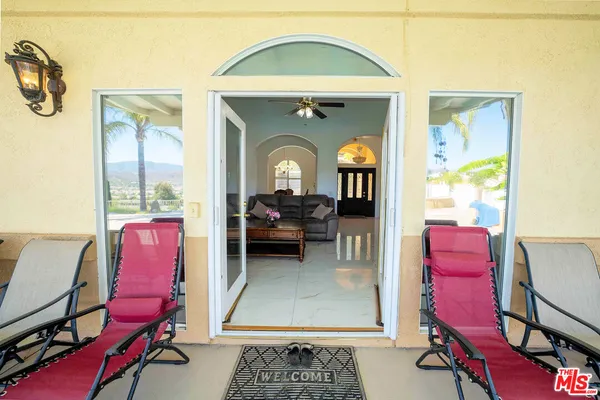 a view of swimming pool with a yard