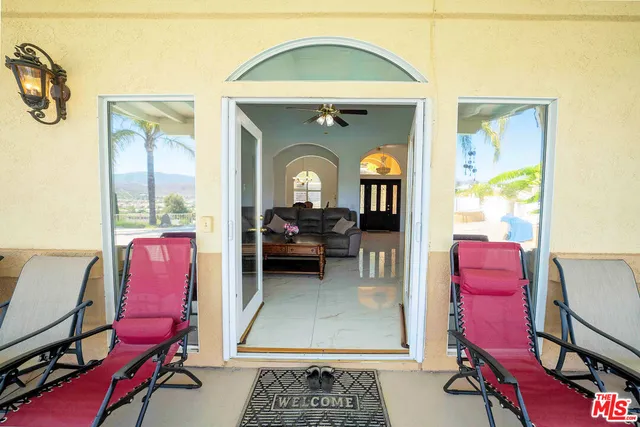 a view of swimming pool with a yard