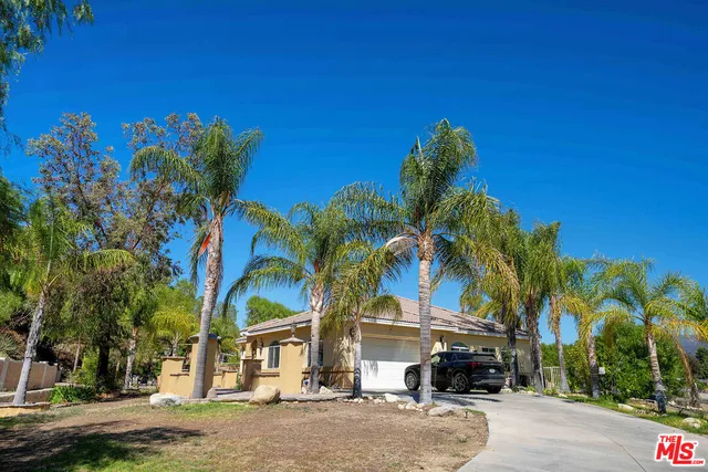 a view of house with a street