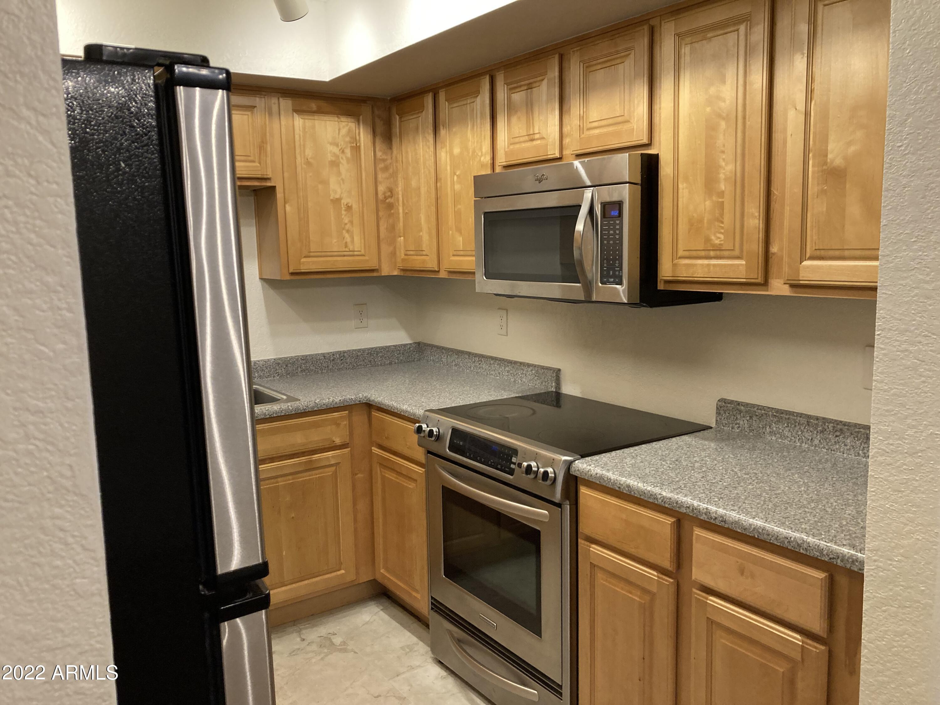 1340 North Recker Road, Unit 244 Mesa, AZ 85205 - Photo 4 of 34 KITCHEN