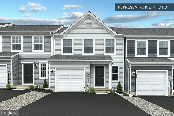 a view of a house with a street