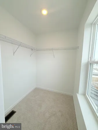 a view of a room with racks on the wall