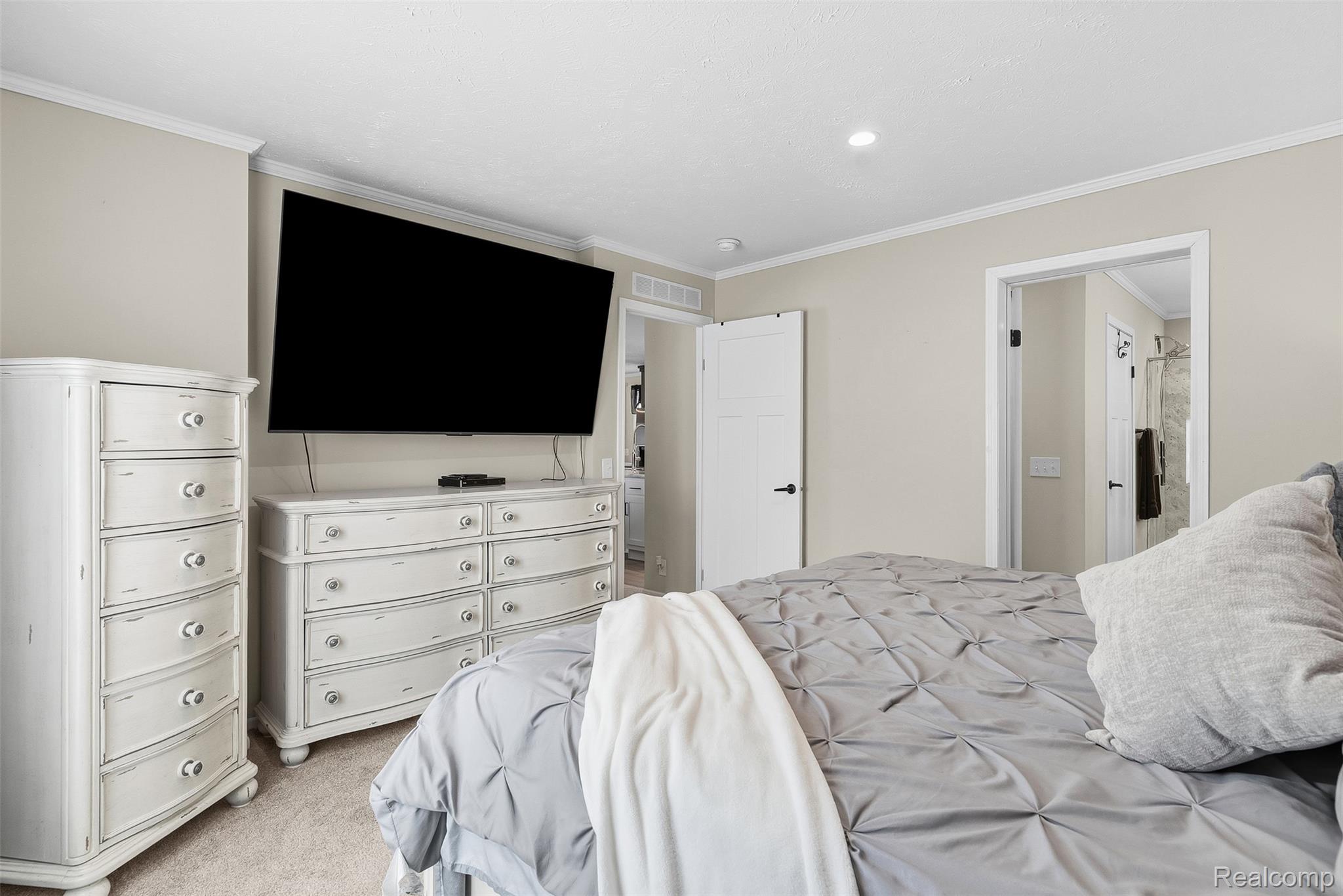 6450 Prince Boulevard Fenton, MI 48430 - Photo 11 of 31 Neutral-toned bedroom featuring recessed lighting, crown molding, and carpeted flooring
