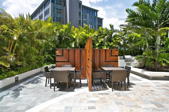 a view of swimming pool with outdoor seating