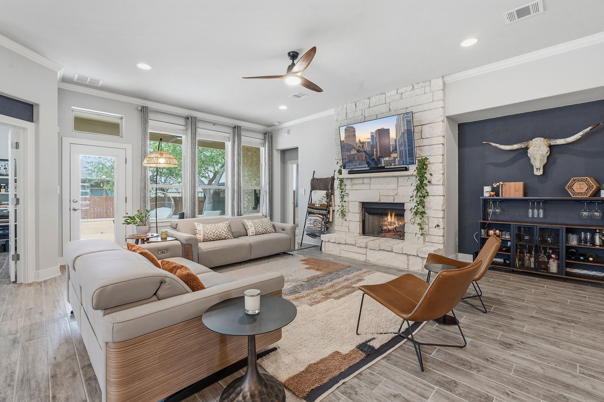a living room with furniture and a fireplace