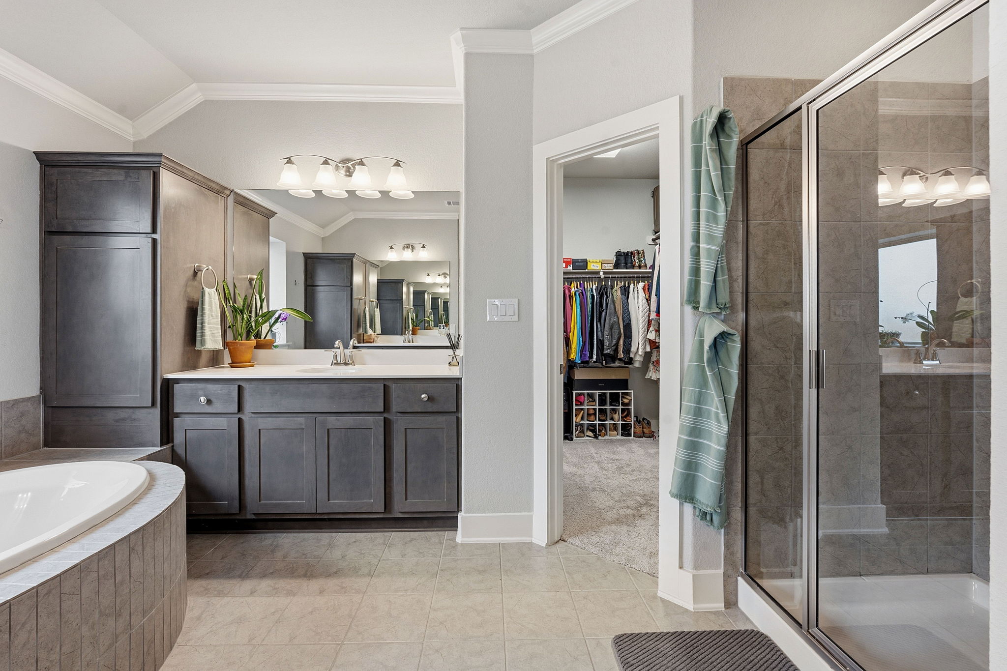 104 Red Granite Road Georgetown, TX 78633 - Photo 22 of 36 a large bathroom with a double vanity sink tub and shower