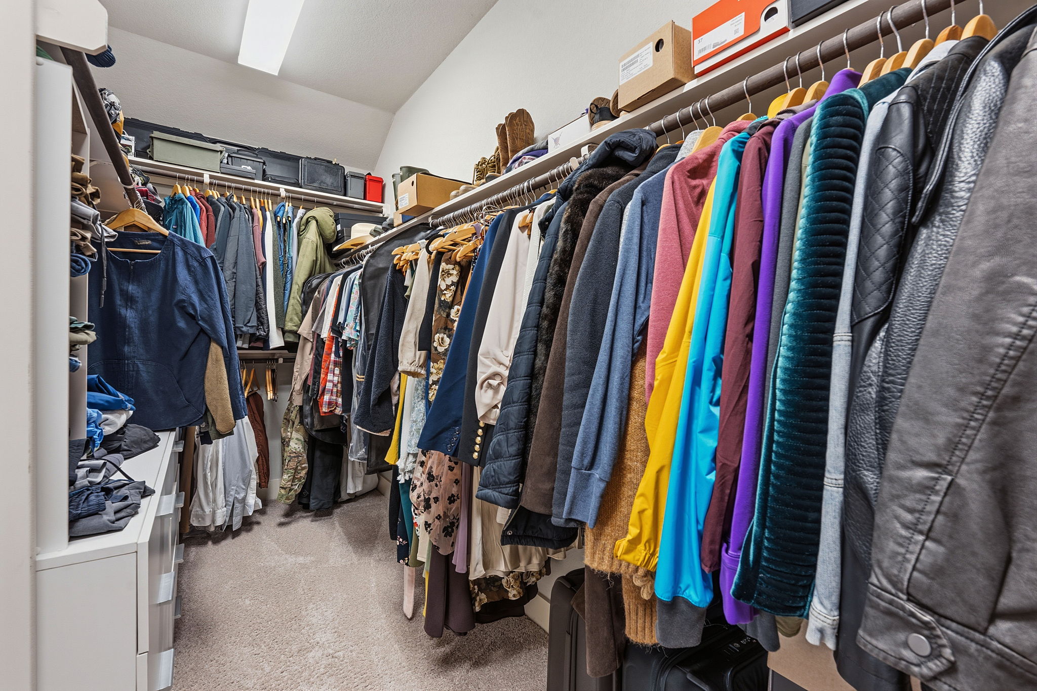 104 Red Granite Road Georgetown, TX 78633 - Photo 23 of 36 a view of walk in closet with clothes