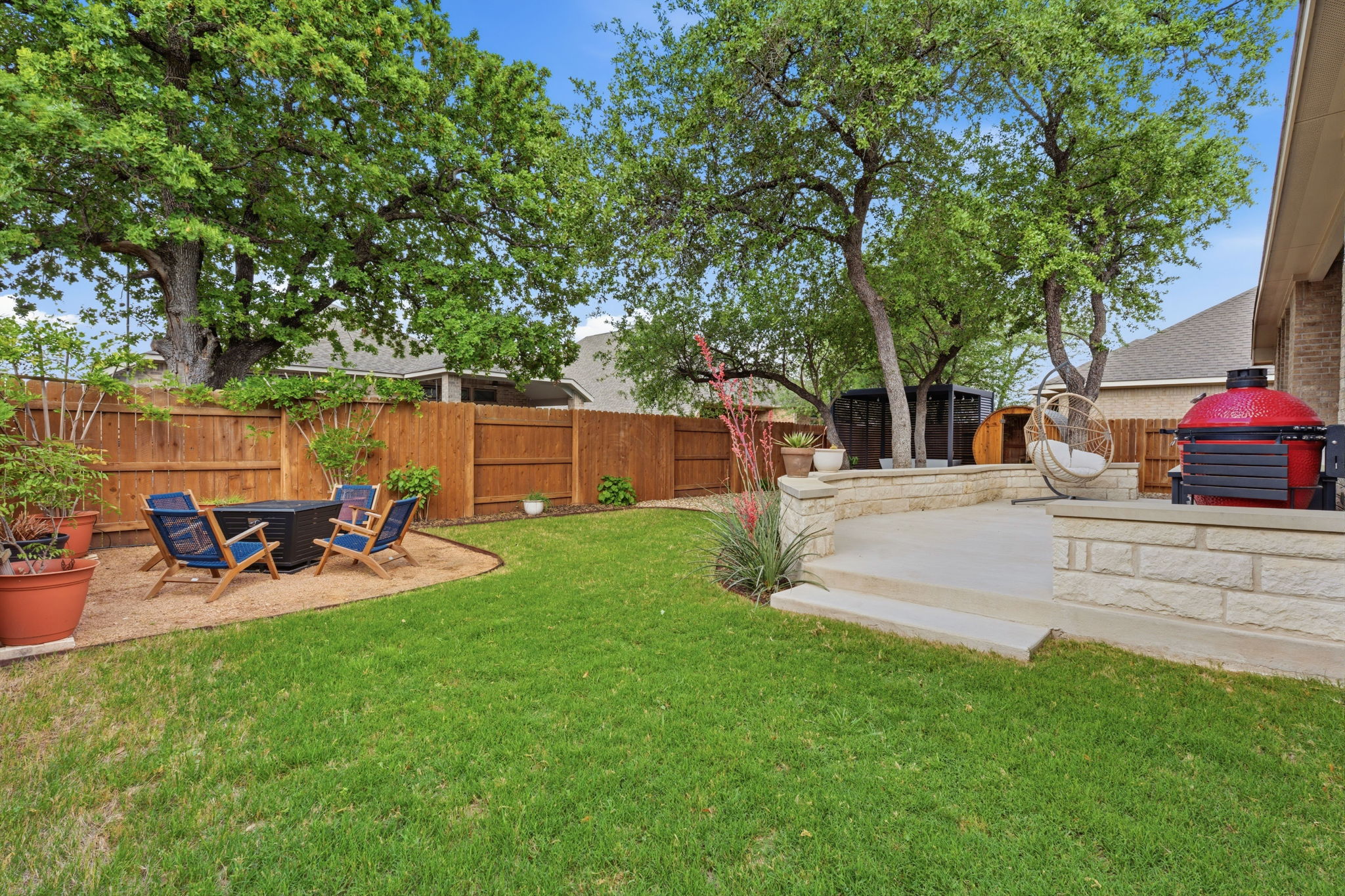 104 Red Granite Road Georgetown, TX 78633 - Photo 33 of 36 a view of a backyard with a sitting area