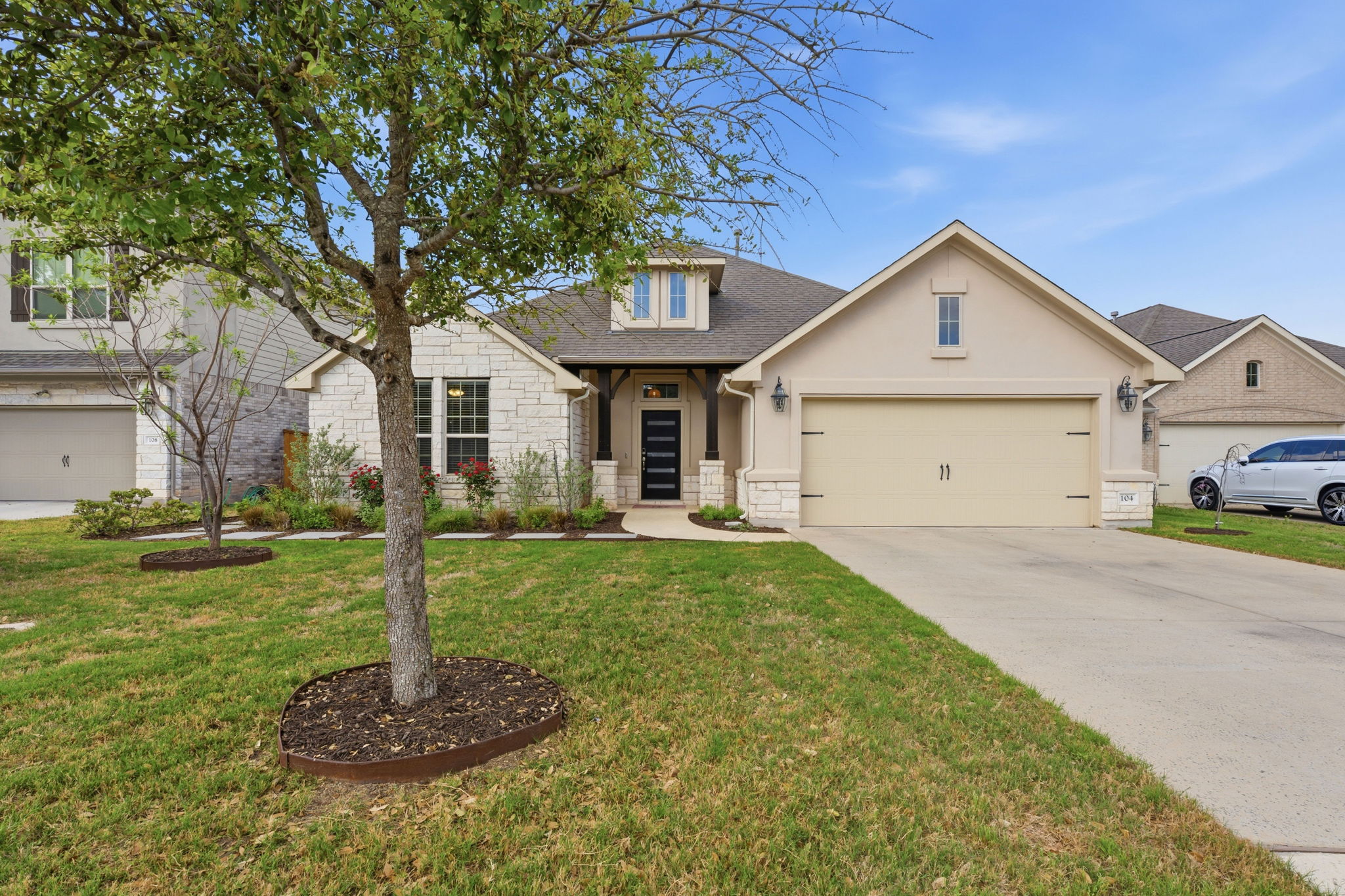104 Red Granite Road Georgetown, TX 78633 - Photo 4 of 36 a front view of house with yard and green space