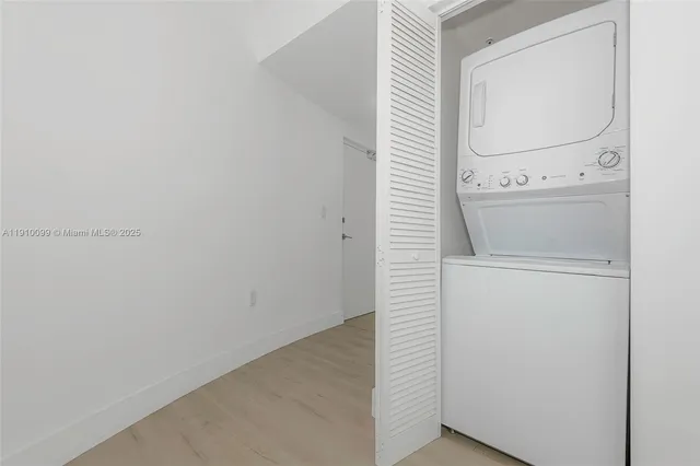 a bathroom with a sink a toilet and bathtub