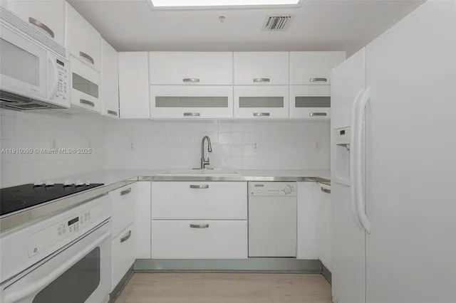 a bedroom with a bed and a chair