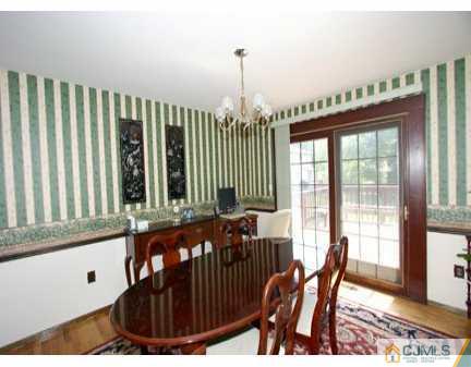 160 Stratton Street South Piscataway, NJ 08854 - Photo 3 of 8 a view of a dining room with furniture window and outside view