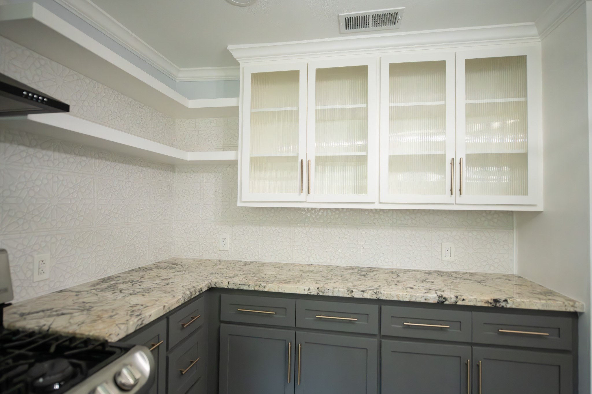 17106 Spring Creek Forest Drive Spring, TX 77379 - Photo 11 of 50 a kitchen with granite countertop cabinets and window