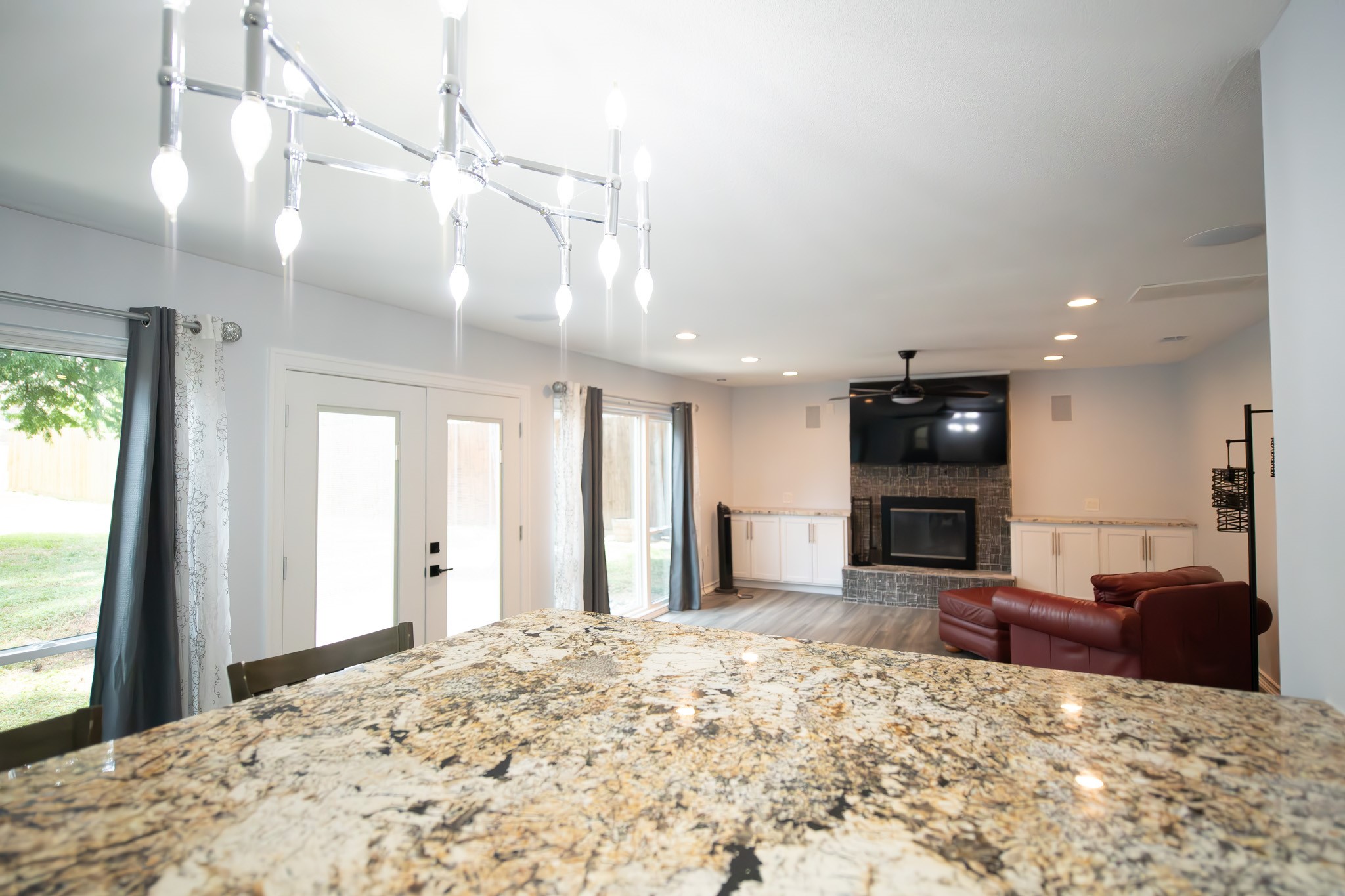 17106 Spring Creek Forest Drive Spring, TX 77379 - Photo 16 of 50 a large bedroom with a large bed and chandelier