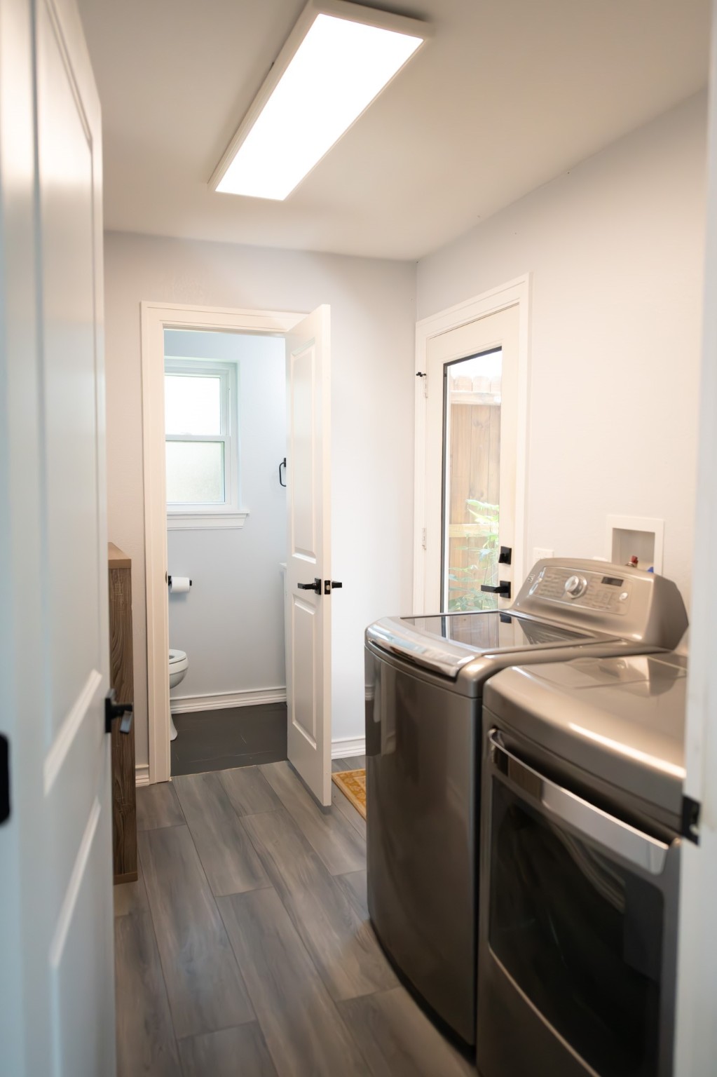 17106 Spring Creek Forest Drive Spring, TX 77379 - Photo 23 of 50 a kitchen with a stove and a refrigerator