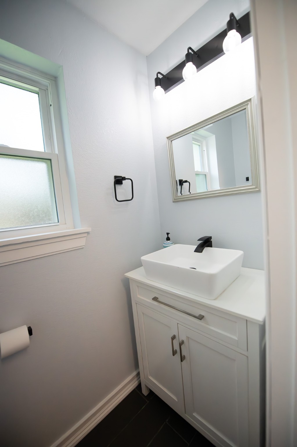 17106 Spring Creek Forest Drive Spring, TX 77379 - Photo 24 of 50 a bathroom with a sink and a mirror