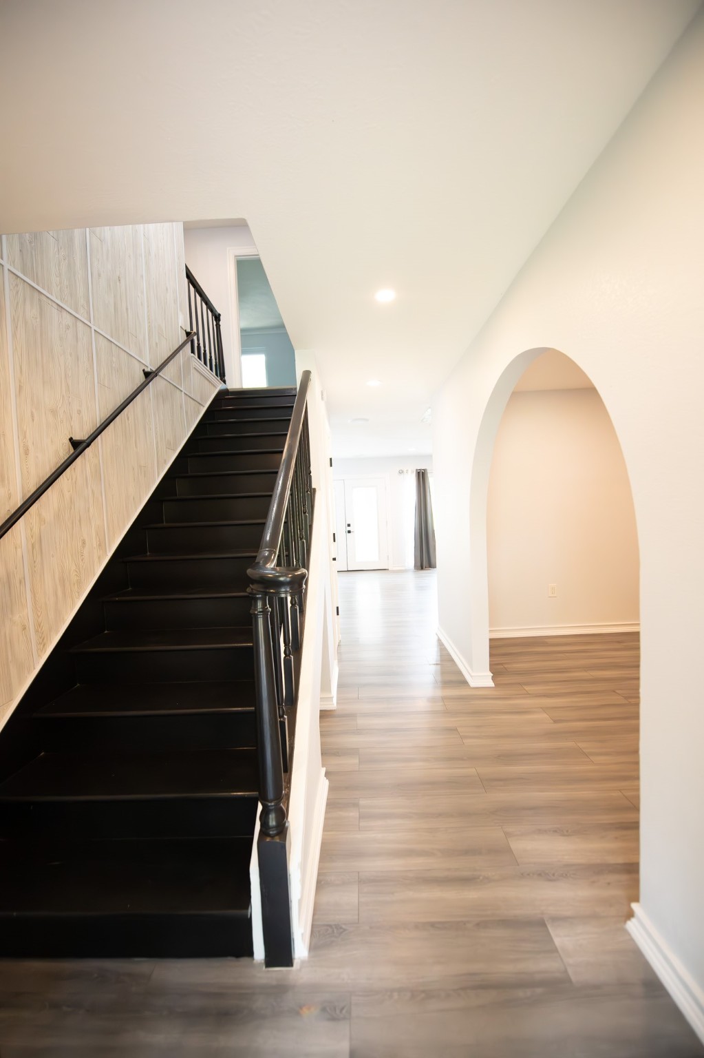 17106 Spring Creek Forest Drive Spring, TX 77379 - Photo 5 of 50 a view of entryway and hall with wooden floor