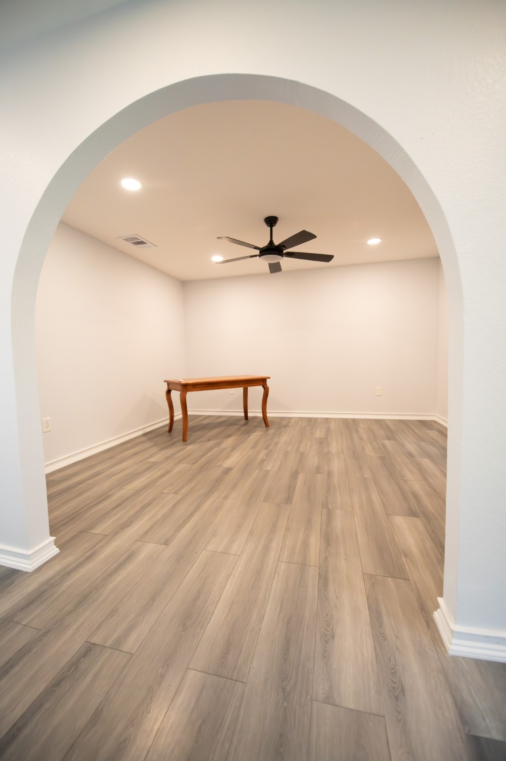 17106 Spring Creek Forest Drive Spring, TX 77379 - Photo 6 of 50 a view of a room with wooden floor